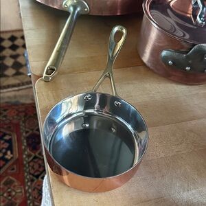 Small new copper stainless w brass handle sauce pan. 4.5” w. Classic chef vibes